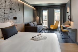 Ένα ή περισσότερα κρεβάτια σε δωμάτιο στο Mercure Montpellier Centre Antigone +91 φωτογραφίες
