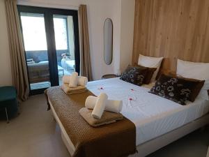 Postel nebo postele na pokoji v ubytování Appt neuf 2-4 pers avec loggia - Piscine chauffée - Bord de mer - Corse du Sud- Bonifacio + 64 fotografií