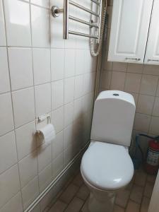 a bathroom with a white toilet in a room at Villa Sun Beach  +16 photos
