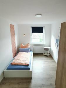 Ένα ή περισσότερα κρεβάτια σε δωμάτιο στο ProStay Lier