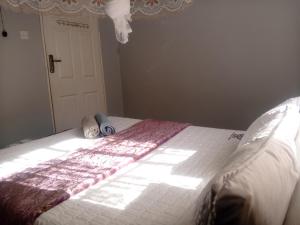Cama o camas de una habitación en Quest