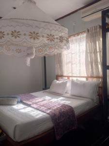 Cama o camas de una habitación en Quest