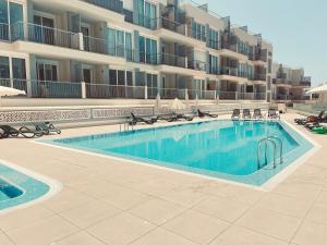 Πισίνα στο ή κοντά στο Villa's homes in Playa Arena