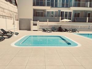 Πισίνα στο ή κοντά στο Villa's homes in Playa Arena