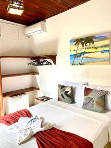 Cama o camas de una habitación en Pousada Arraial Lua Crescente