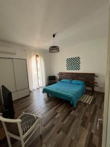 Postel nebo postele na pokoji v ubytování Naxos Tales