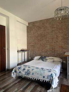 Postel nebo postele na pokoji v ubytování Naxos Tales