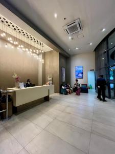 Posezení v ubytování Magsayo Cozy Room