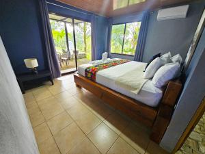 Ένα ή περισσότερα κρεβάτια σε δωμάτιο στο Famillies Getaway - 3Bed & 2Bath in Arenal Volcano