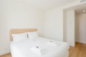 Postel nebo postele na pokoji v ubytování Liiiving in Matosinhos - Factory Pearl Apartment