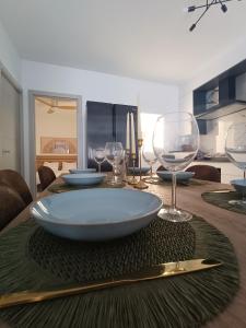 a dining room table with a large bowl on top of it at Casa Aguadulce Puerto in Aguadulce