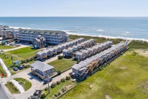 an aerial view of a resort next to the ocean at Southern Comfort Cabana #25ODC-H in Hatteras