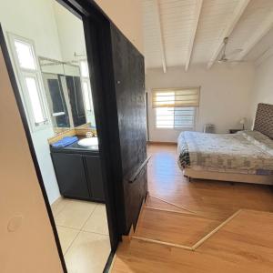 Katil atau katil-katil dalam bilik di Departamento Costa Azul VCP