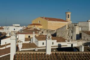 a view of a city from the roof of a church at Can Alberti 1740 Boutique Hotel in Mahón