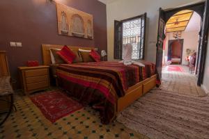 Uma cama ou camas num quarto em Riad Salma Restaurant Spa