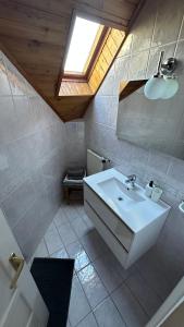 Koupelna v ubytování Pacsirta Apartman + 35 fotografií