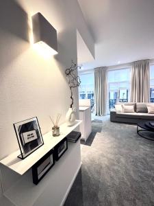 Μια τηλεόραση ή/και κέντρο ψυχαγωγίας στο Magnificent apartment in Sablon +31 φωτογραφίες