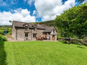 an old stone house with a large yard at 4 Bed in Longtown 86497 in Llanveynoe