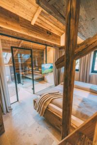 Ένα ή περισσότερα κρεβάτια σε δωμάτιο στο Chalet Hideaway Alpi