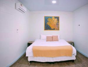 Postel nebo postele na pokoji v ubytování Hotel Luna Bella