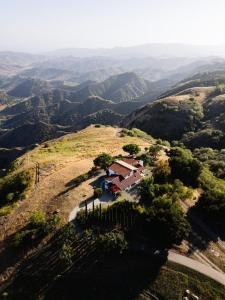 an aerial view of a house on top of a mountain at Oja Mountain Ridge in Ojai