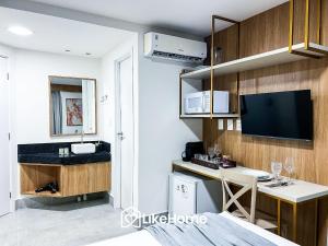 Μια τηλεόραση ή/και κέντρο ψυχαγωγίας στο Legacy Suítes - LikeHome Hospedagens