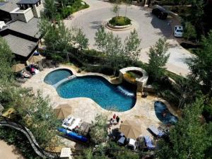 an overhead view of a swimming pool in a resort at Lodge Tower 281 in Vail