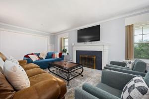 a living room with a couch and a fireplace at 1515 Callender, unit 2 in Peoria