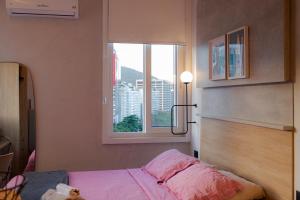 Postel nebo postele na pokoji v ubytování 360 Botafogo Belair By SUHCasa