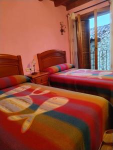Postel nebo postele na pokoji v ubytování Apartamento Aran