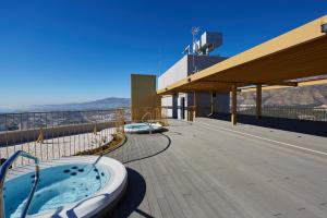 a hot tub on the roof of a building at Intempo Sea View by Leo Apartments in Benidorm