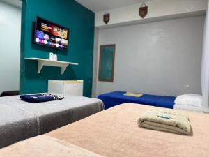 En eller flere senge i et værelse på Pousada Açude Velho II