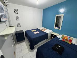 En eller flere senge i et værelse på Pousada Açude Velho II