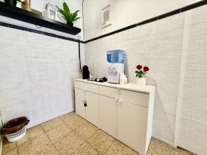 a room with a counter with a coffee maker on it at Rooms La Laja 2 in Las Palmas de Gran Canaria