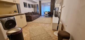 TV a/nebo společenská místnost v ubytování White Cozy Home