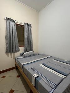 Ένα ή περισσότερα κρεβάτια σε δωμάτιο στο Padilla