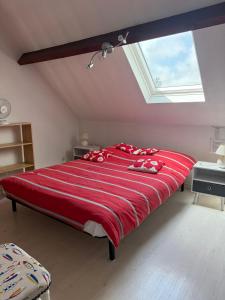 Postel nebo postele na pokoji v ubytování La maison de la Baie