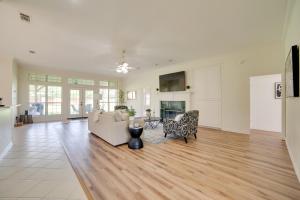 a living room with a couch and a table at Game Room and Bar Secluded Getaway in Farmersville in Nevada