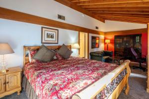 a bedroom with a large bed in a room at NorthShore # 47 By Hauserman Rentals in Tahoe City +41 photos