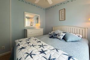 Ένα ή περισσότερα κρεβάτια σε δωμάτιο στο The Starfish Cottage +32 φωτογραφίες
