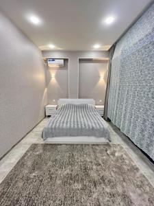 Postel nebo postele na pokoji v ubytování AZ Villa in Gabala + 18 fotografií