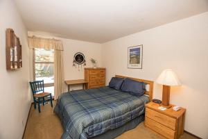 En eller flere senge i et værelse på Villas # 78 By Hauserman Rentals