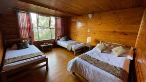 Postel nebo postele na pokoji v ubytování Minca El Dorado Reserve + 19 fotografií