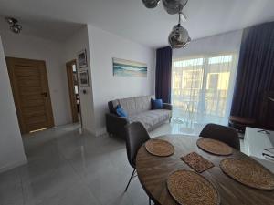 Ruang duduk di Apartament Słoneczny +9 gambar
