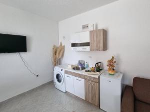 Η κουζίνα ή μικρή κουζίνα στο Apartmani Velić
