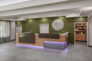 a lobby with a counter inside of a hospital at Fairfield Inn & Suites Oakland Hayward in Hayward