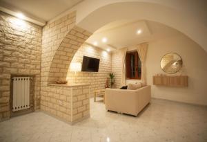 TV a/nebo společenská místnost v ubytování ilrifugiosalerno