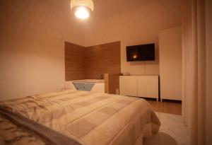 Postel nebo postele na pokoji v ubytování ilrifugiosalerno