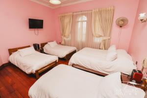Ένα ή περισσότερα κρεβάτια σε δωμάτιο στο Hotel Cordillera