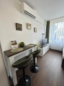 Ένα ή περισσότερα κρεβάτια σε δωμάτιο στο Horgony apartman Balatonalmádi